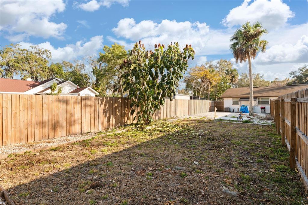5707 Tennessee Avenue New Port Richey, FL 34652 - Photo 26 of 26 a house with garden view