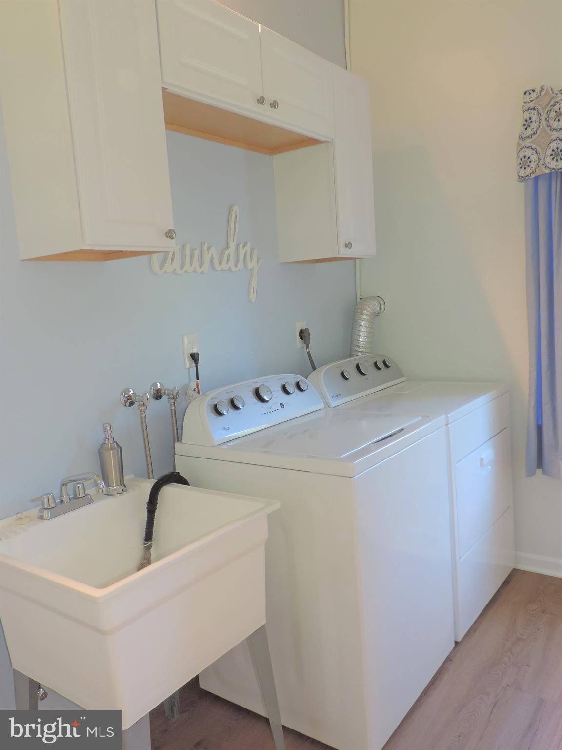435 Priestford Road Churchville, MD 21028 - Photo 31 of 54 Laundry Room with cabinets and closet