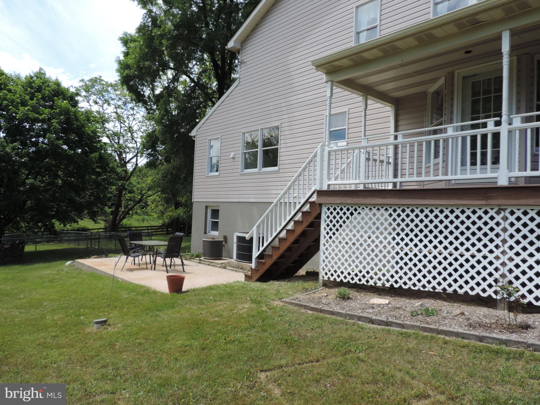 435 Priestford Road Churchville, MD 21028 - Photo 6 of 54 Side view of home and patio