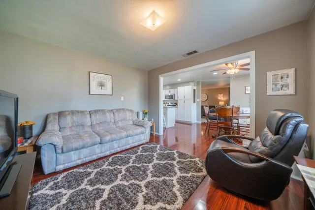a living room with furniture and a couch