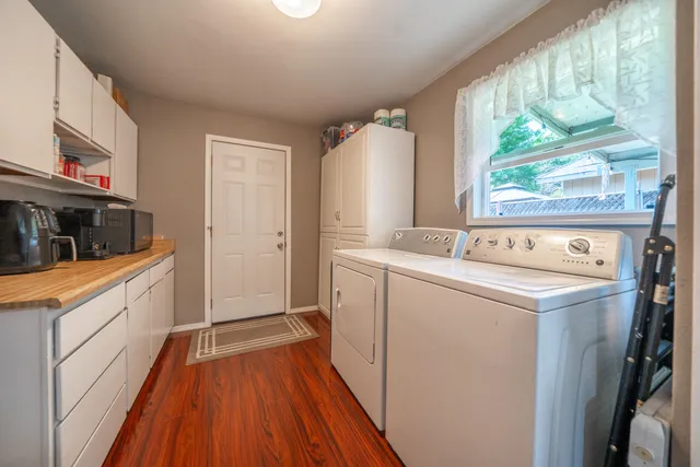 a utility room with washer and dryer