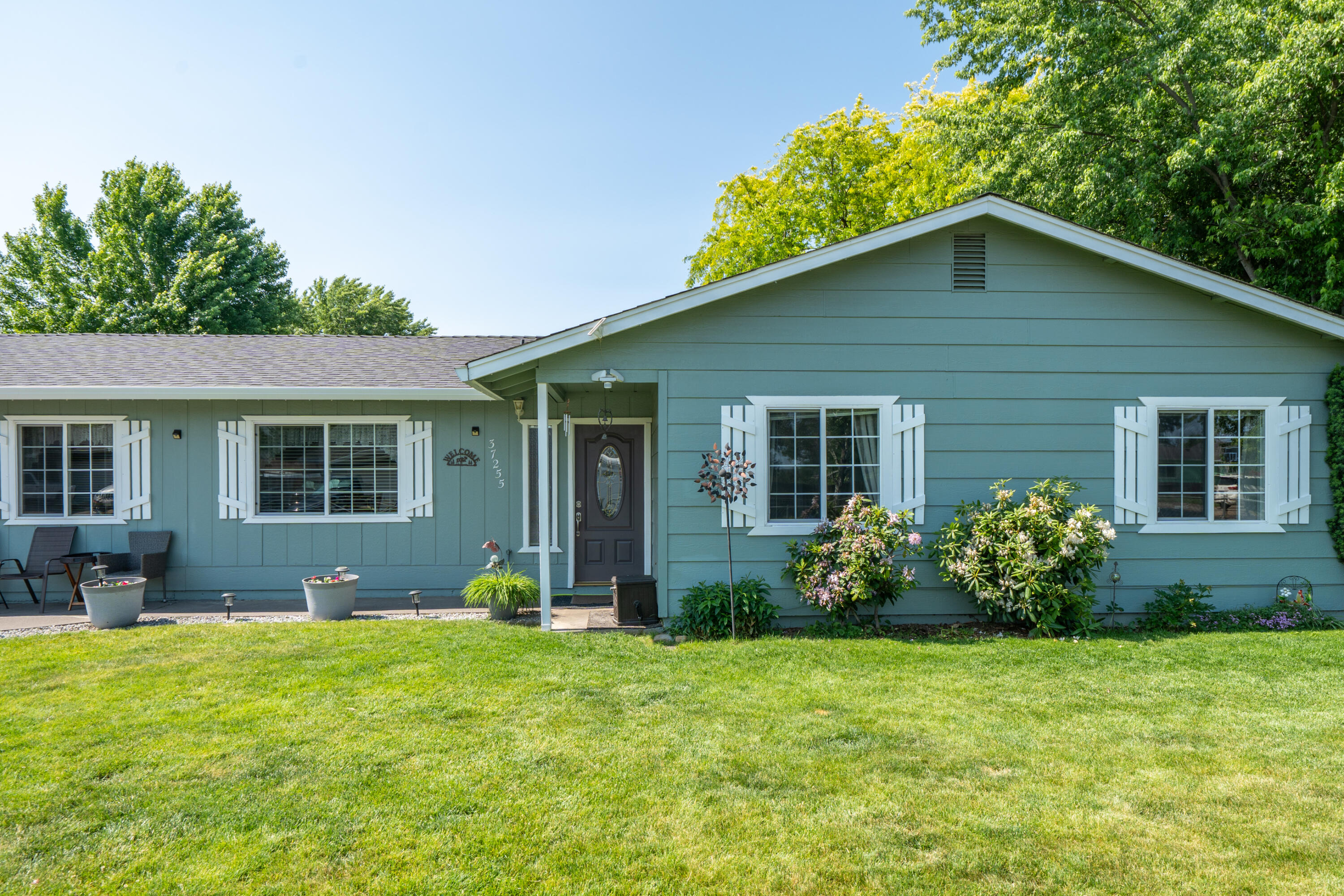37255 Carson Street Burney, CA 96013 - Photo 5 of 40 a house view with a garden space
