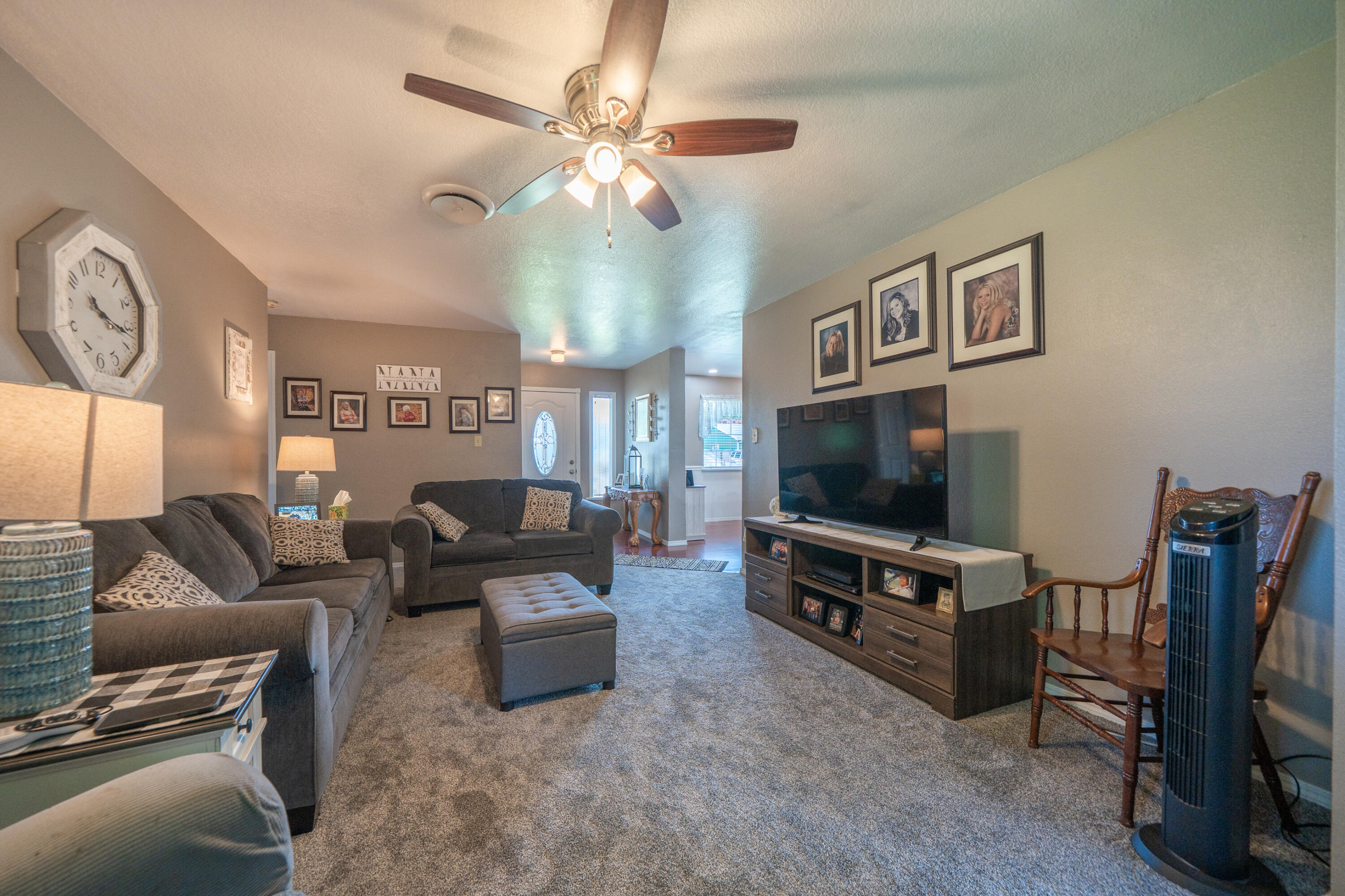 37255 Carson Street Burney, CA 96013 - Photo 9 of 40 a living room with furniture and a flat screen tv