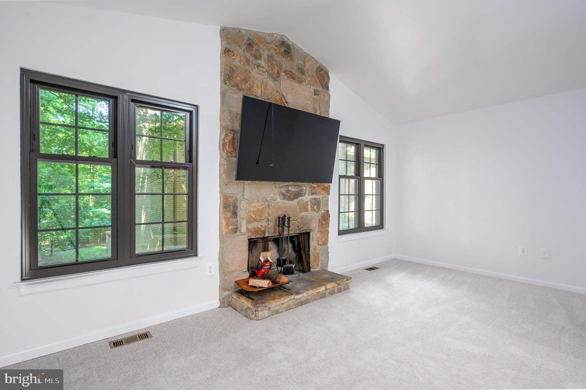 2060 Headlands Circle Reston, VA 20191 - Photo 12 of 26 a view of empty room with fireplace and window