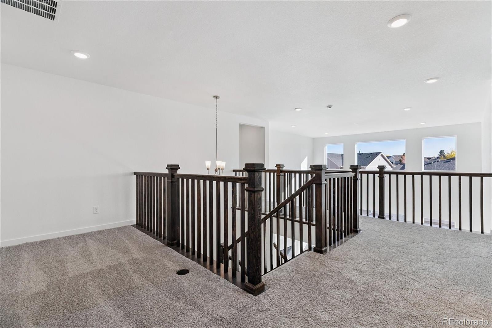 2572 West Bitterroot Place Highlands Ranch, CO 80129 - Photo 15 of 30 a view of a hallway