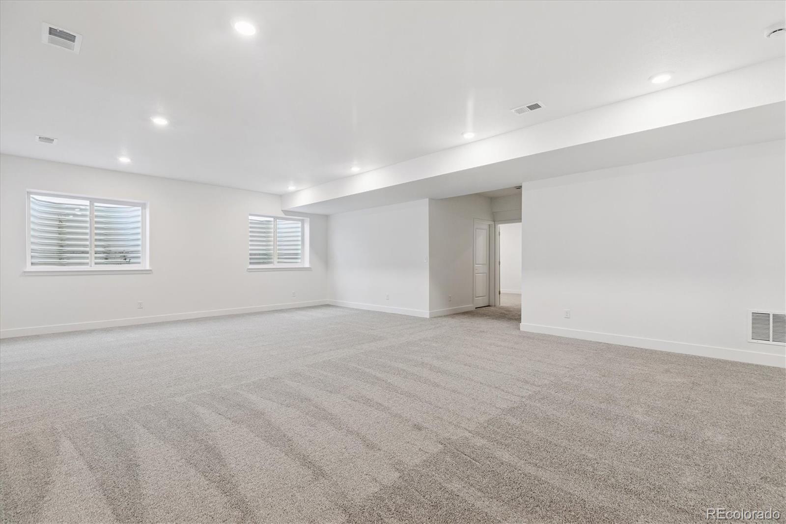 2572 West Bitterroot Place Highlands Ranch, CO 80129 - Photo 23 of 30 a view of an empty room with a window