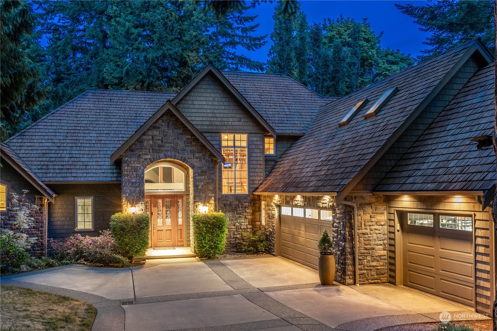 5447 Canvasback Road Blaine, WA 98230 - Photo 1 of 40 a front view of a house with garden
