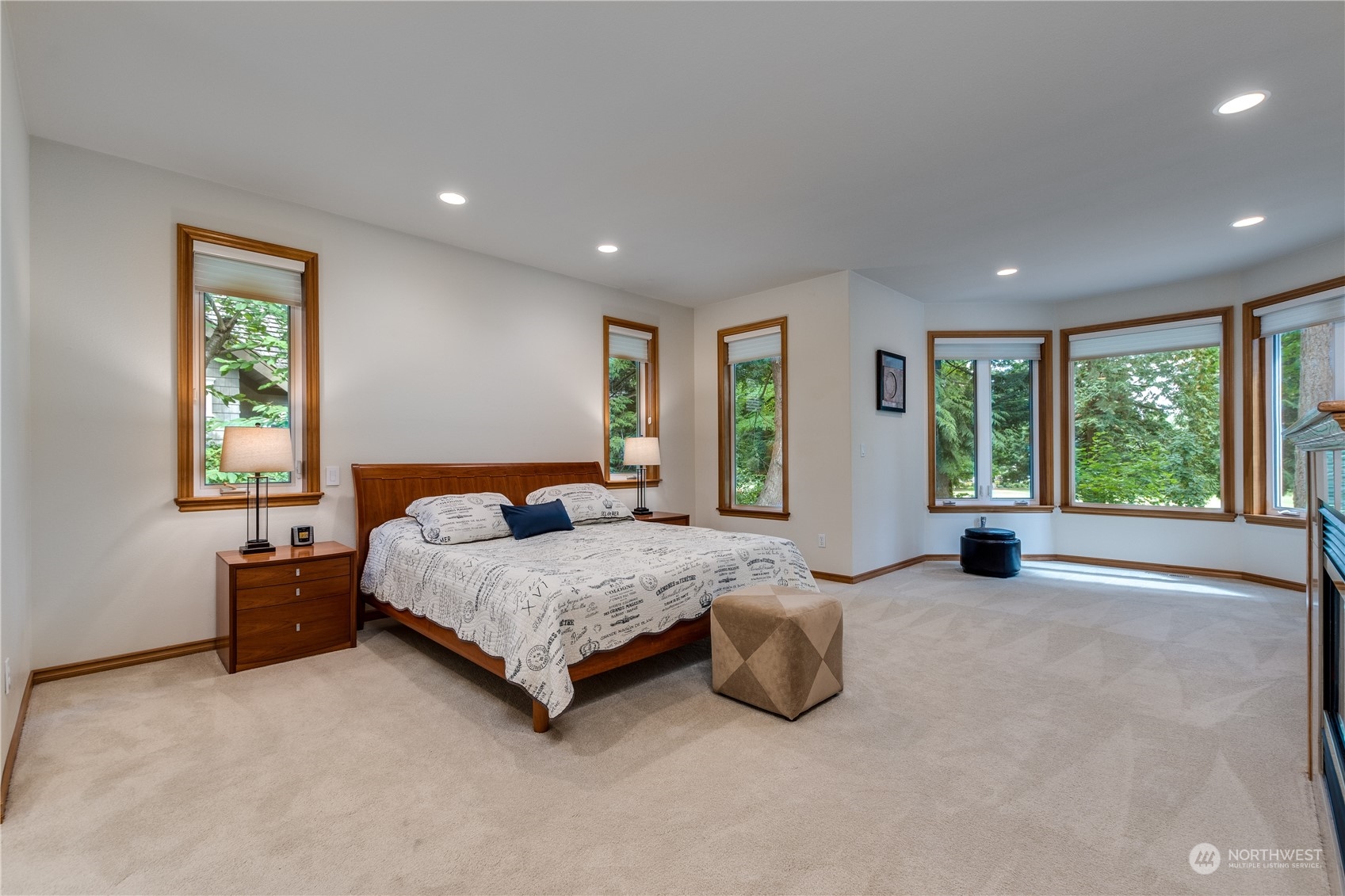5447 Canvasback Road Blaine, WA 98230 - Photo 18 of 40 a spacious bedroom with a bed and large windows