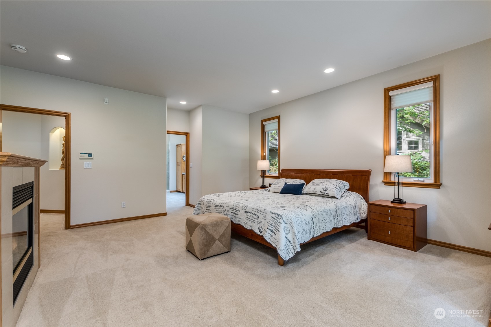 5447 Canvasback Road Blaine, WA 98230 - Photo 19 of 40 a spacious bedroom with a bed and a window