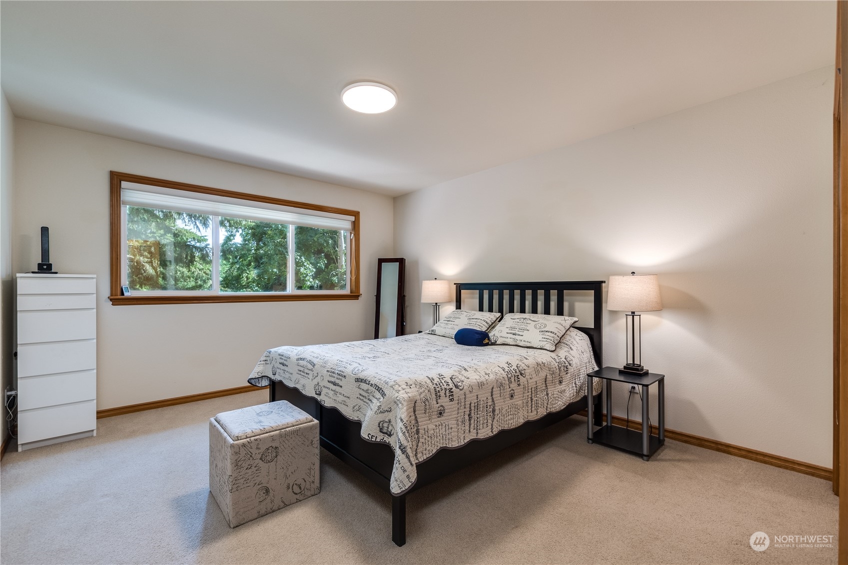 5447 Canvasback Road Blaine, WA 98230 - Photo 24 of 40 a bedroom with a bed and window