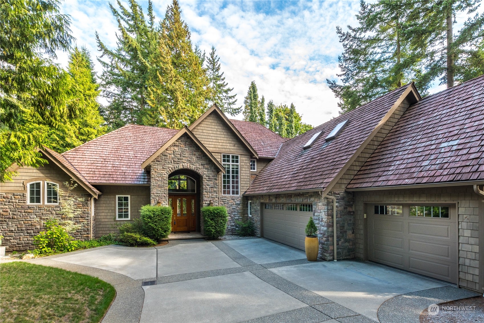 5447 Canvasback Road Blaine, WA 98230 - Photo 3 of 40 a view of a house with a patio