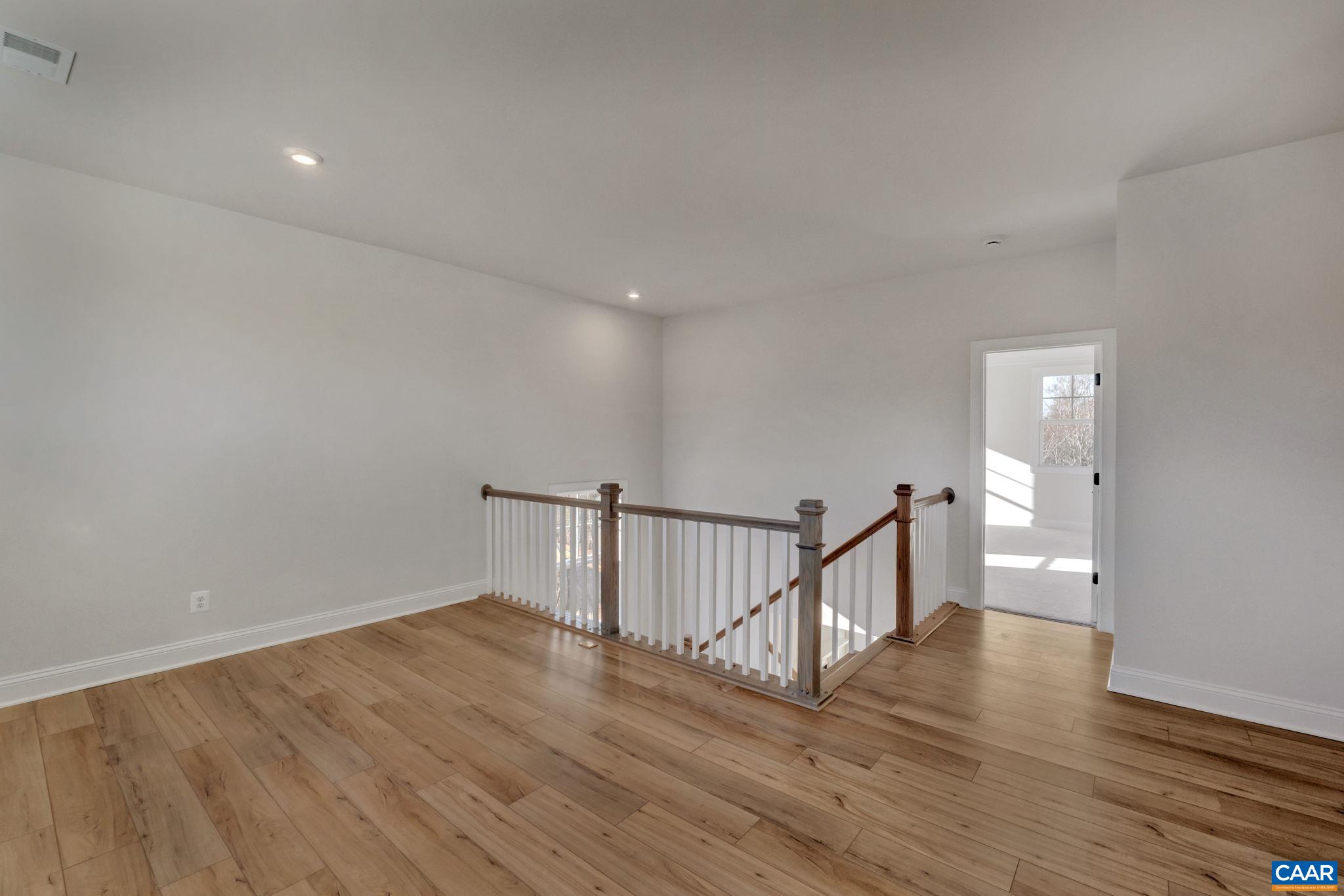 109 B Marcella Street Charlottesville, VA 22911 - Photo 23 of 36 a view of hallway with wooden floor