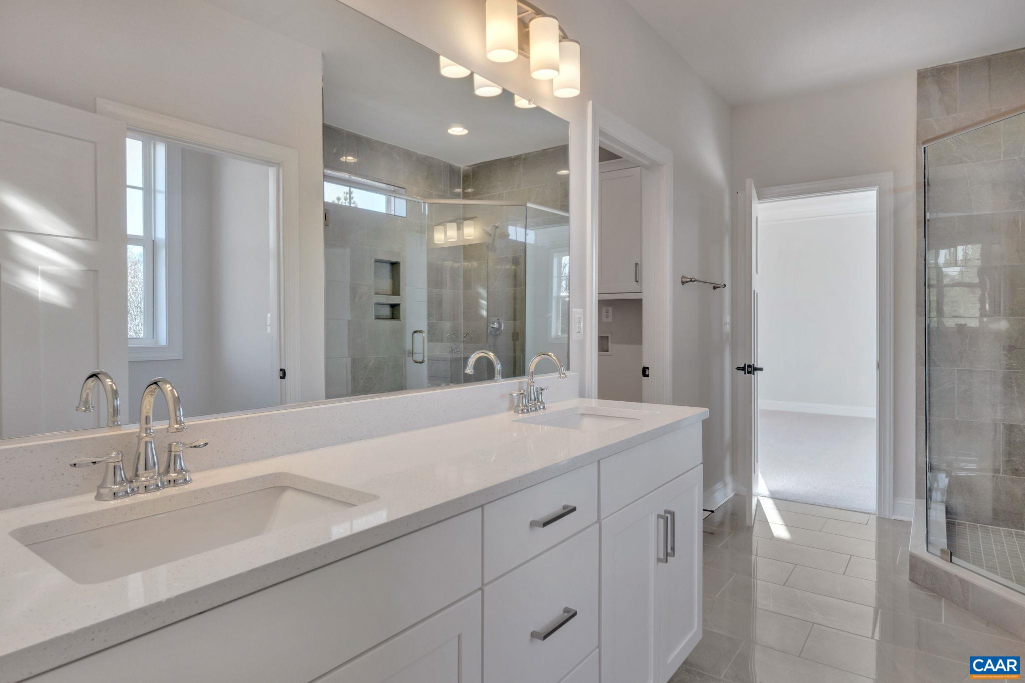 109 B Marcella Street Charlottesville, VA 22911 - Photo 26 of 36 a bathroom with a sink double vanity granite tub and shower