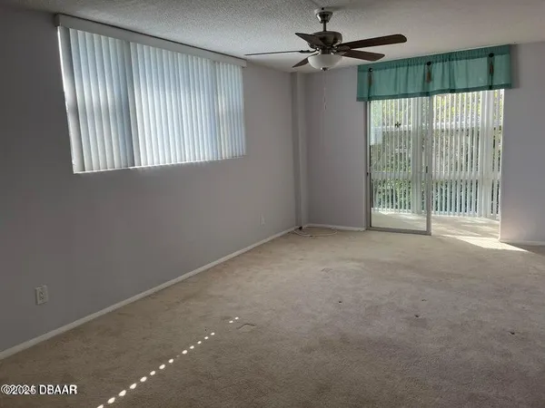 a view of balcony with wooden floor