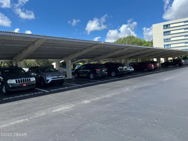a view of a car park from a hallway