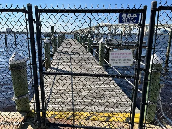 a view of a chandelier in hallway