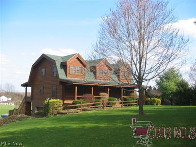1974 May Road Mogadore, OH 44260 - Photo 1 of 1 Custom Built Yellow Pine Log home. Highest point of Portage County provides terrific views!
