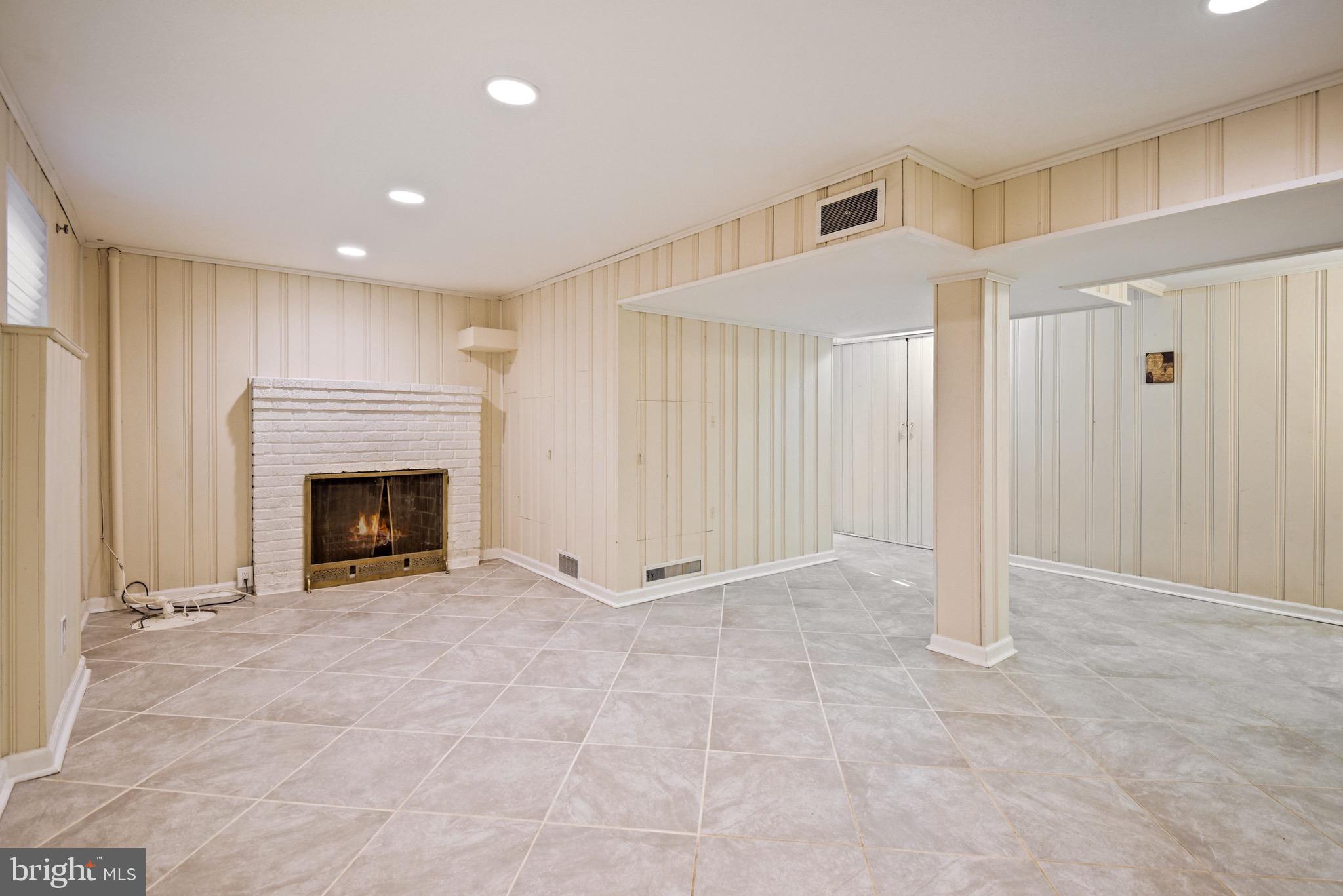 9404 Flower Avenue Silver Spring, MD 20901 - Photo 24 of 45 Current Lower Level with Tile