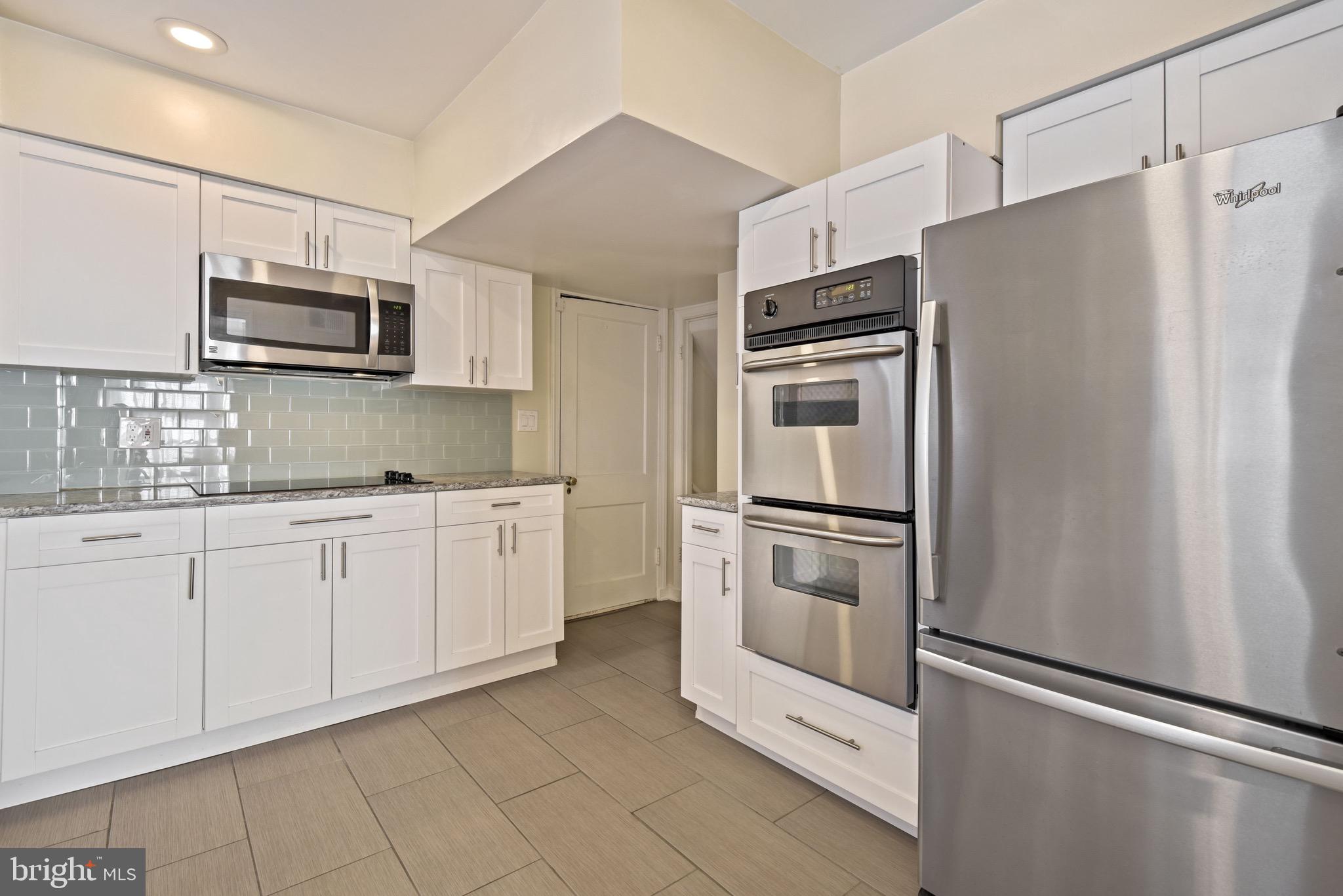 9404 Flower Avenue Silver Spring, MD 20901 - Photo 7 of 45 Renovated Kitchen