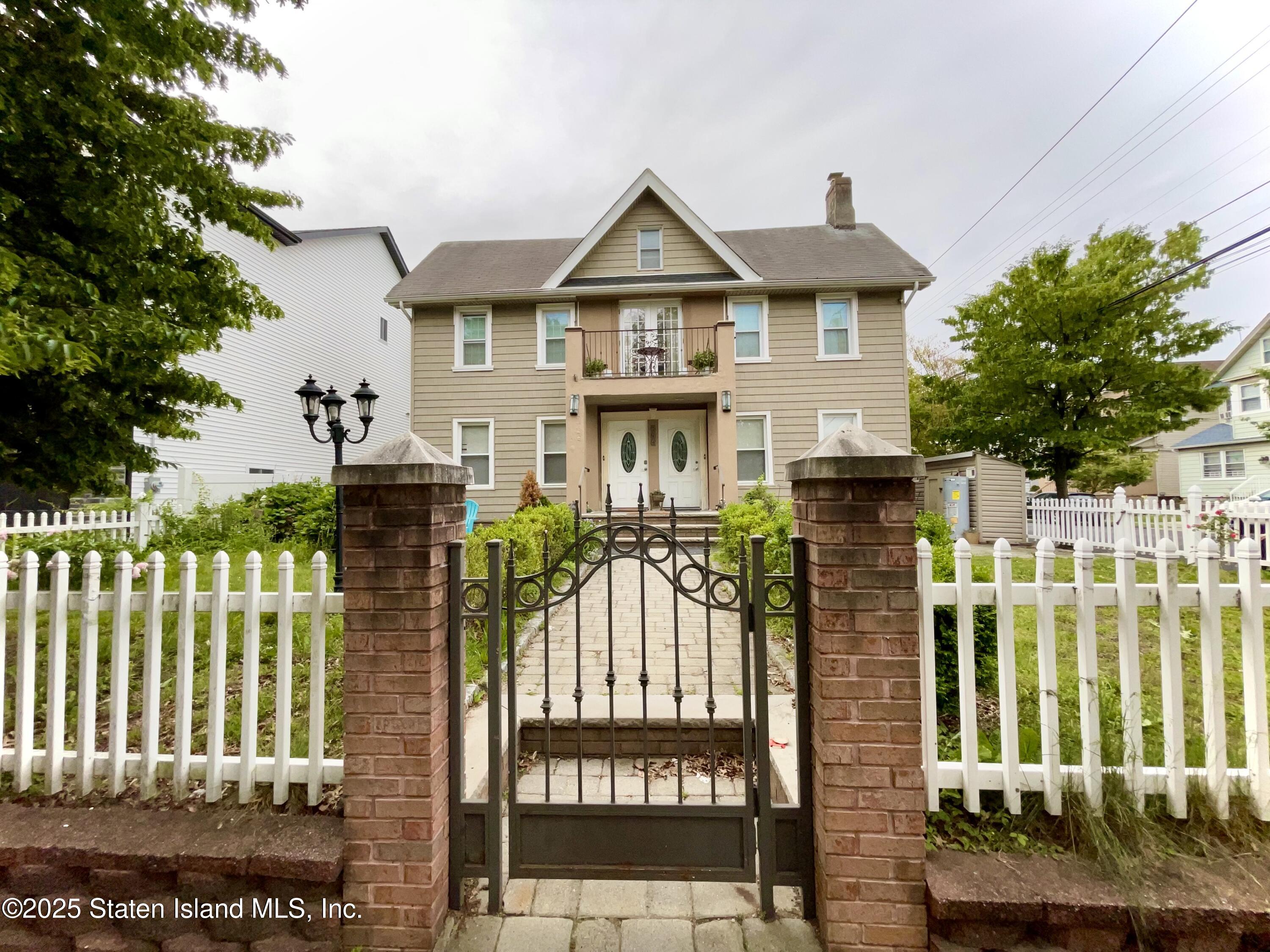 a front view of a house with a porch