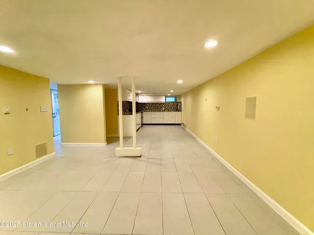 a view of a kitchen with a sink
