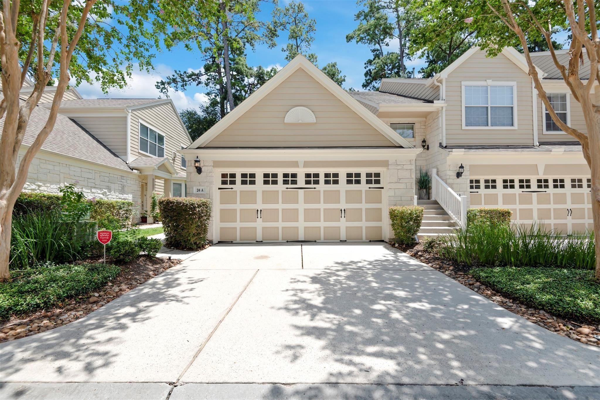 13600 Breton Ridge Street, Unit 24A Houston, TX 77070 - Photo 1 of 24 a front view of a house with a yard