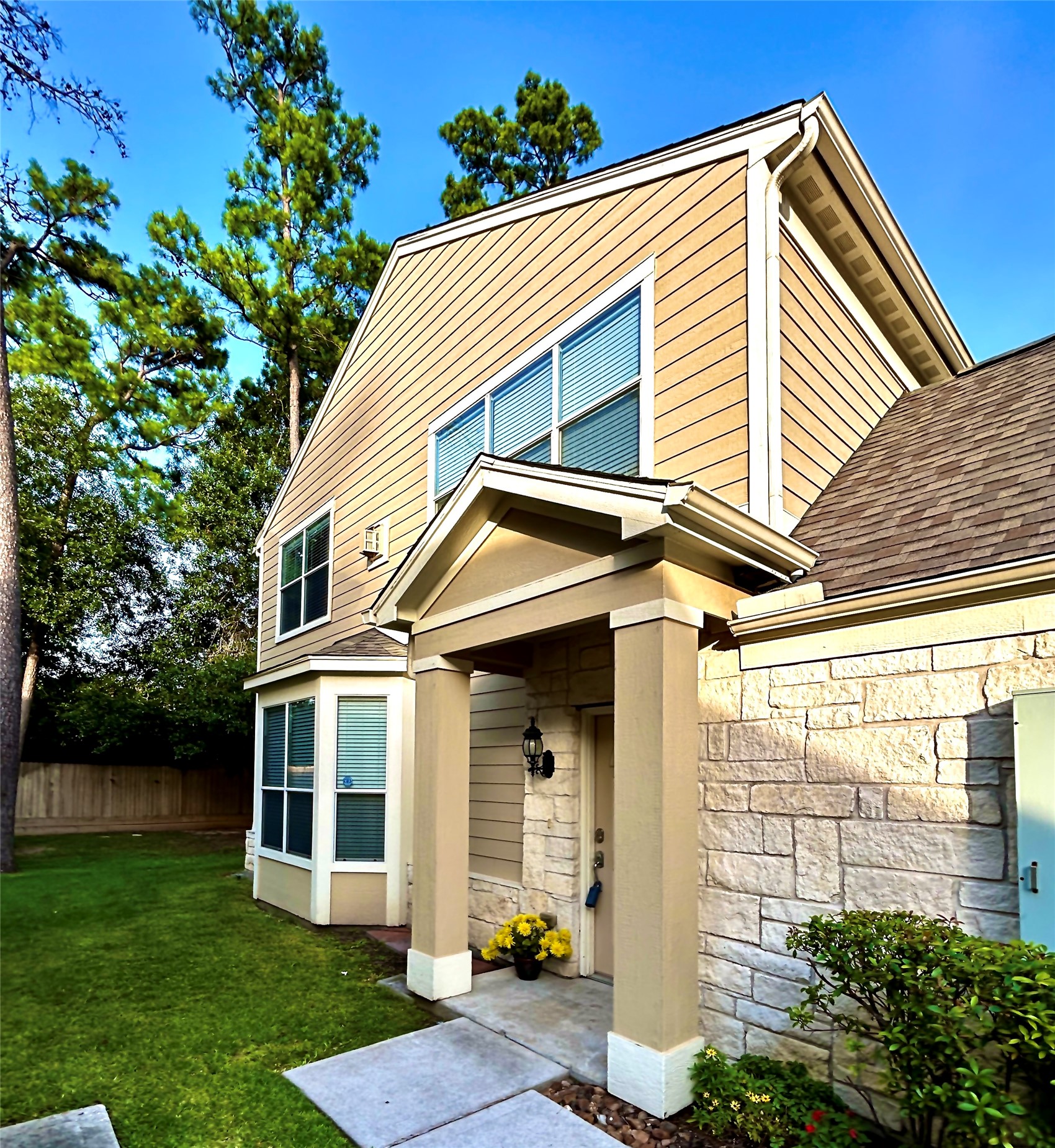 13600 Breton Ridge Street, Unit 24A Houston, TX 77070 - Photo 21 of 24 a view of a house with a yard