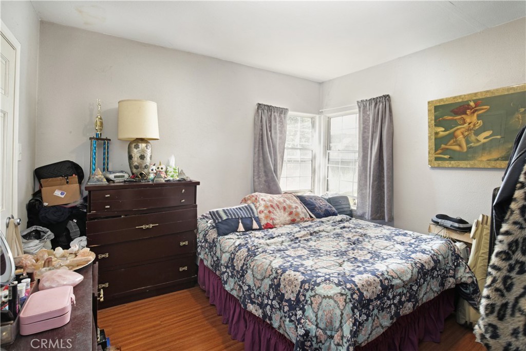 2001 Berkeley Avenue Los Angeles, CA 90026 - Photo 16 of 40 a bedroom with a bed and a window