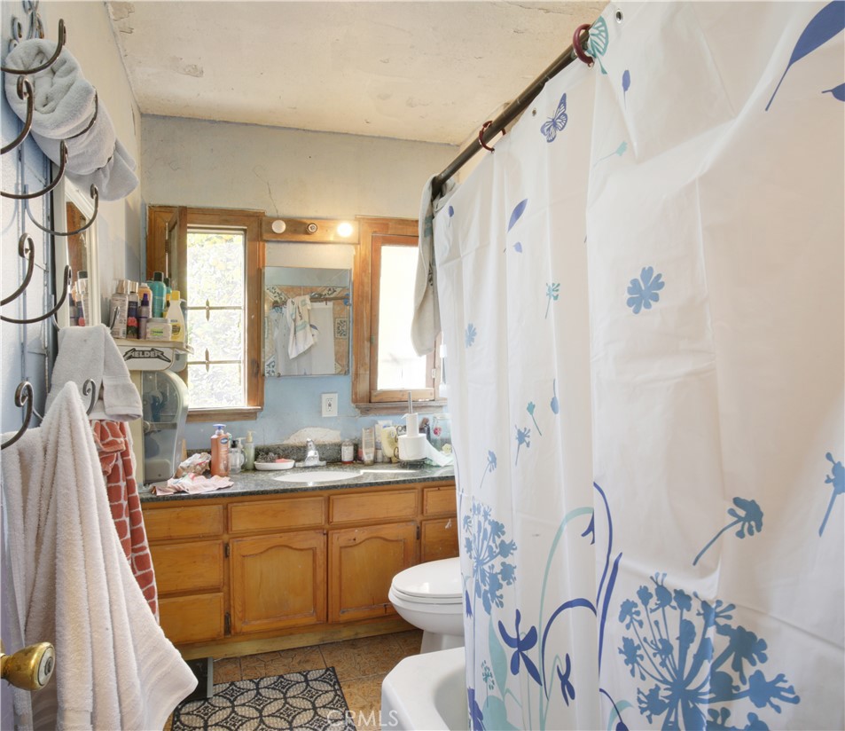2001 Berkeley Avenue Los Angeles, CA 90026 - Photo 8 of 40 a bathroom with a sink toilet and shower