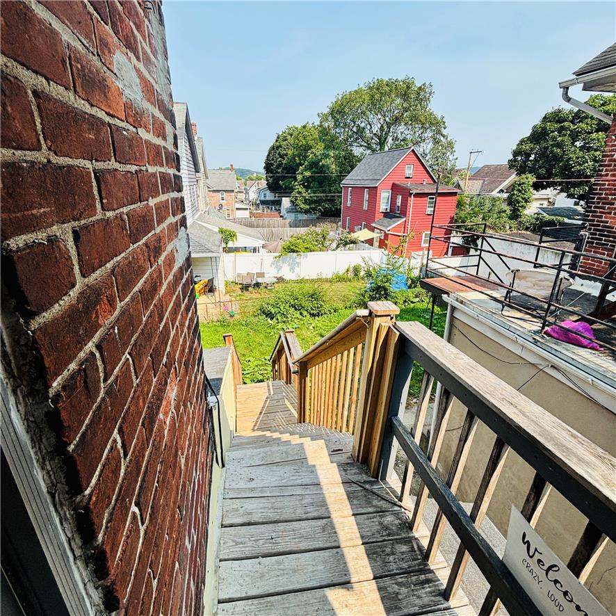 718 Linden Street Bethlehem, PA 18018 - Photo 9 of 19 Descend wooden steps to a private backyard oasis, embraced by neighborhood charm.