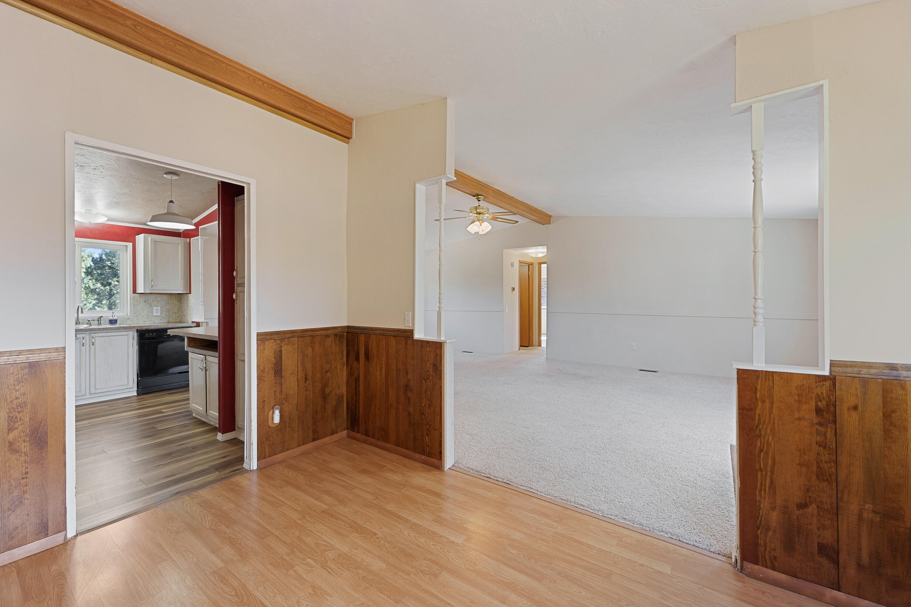 5674 Southeast Davis Loop Prineville, OR 97754 - Photo 17 of 48 a view of a hallway with wooden floor