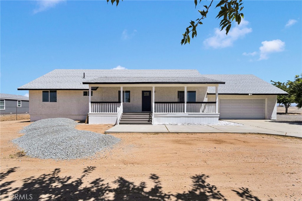 8038 Begonia Road Phelan, CA 92371 - Photo 2 of 49 a house with a outdoor space
