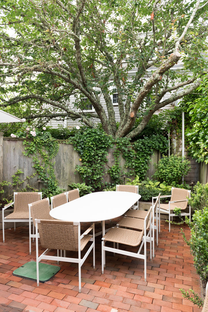 59 Orange Street Nantucket, MA 02554 - Photo 38 of 42 a view of an outdoor sitting area with couch