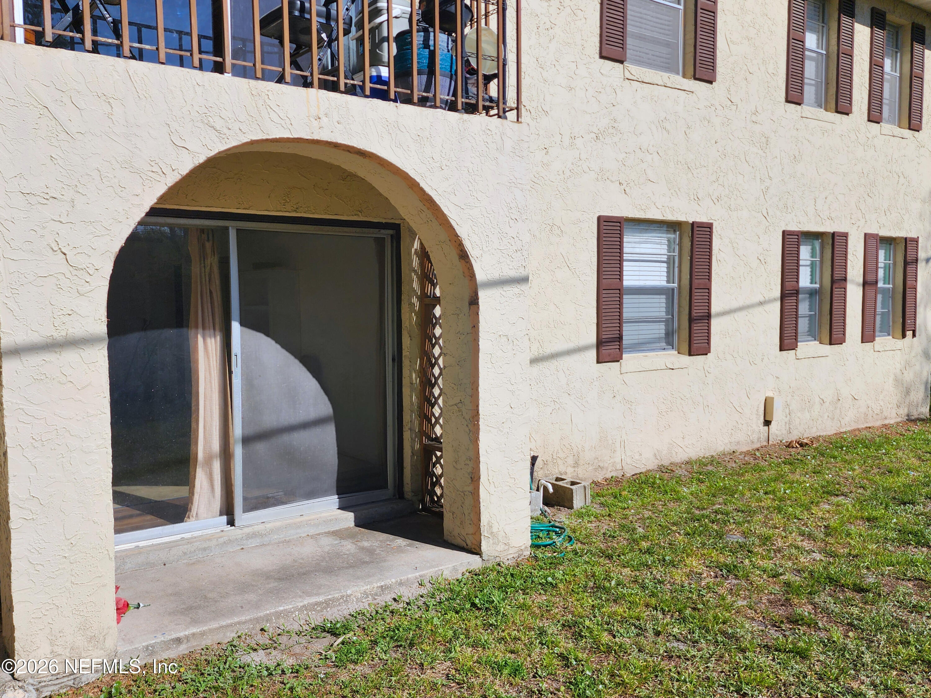 1716 El Camino Road, Unit 1 Jacksonville, FL 32216 - Photo 13 of 15 a brick building with a sink in front of it