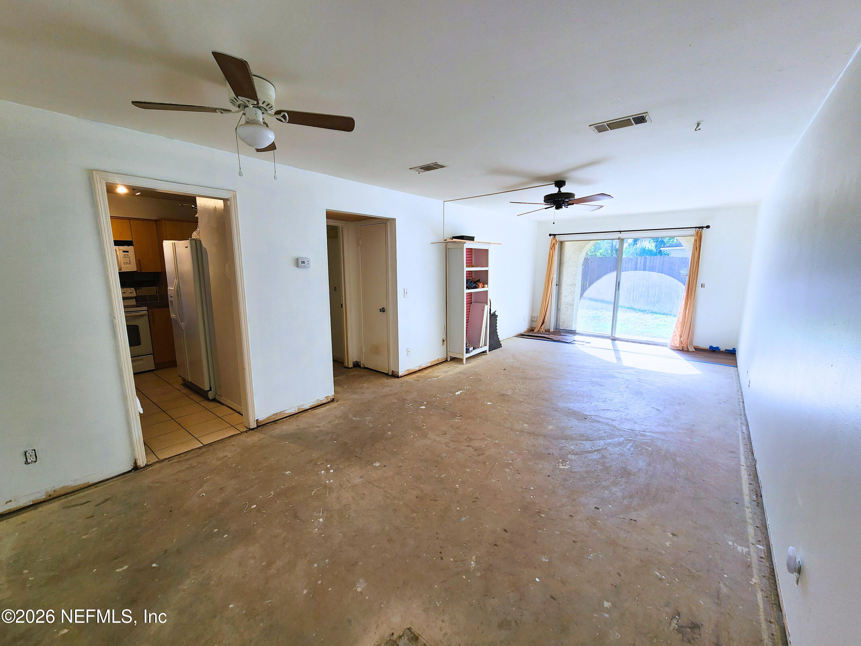 1716 El Camino Road, Unit 1 Jacksonville, FL 32216 - Photo 2 of 15 a view of a livingroom with a ceiling fan