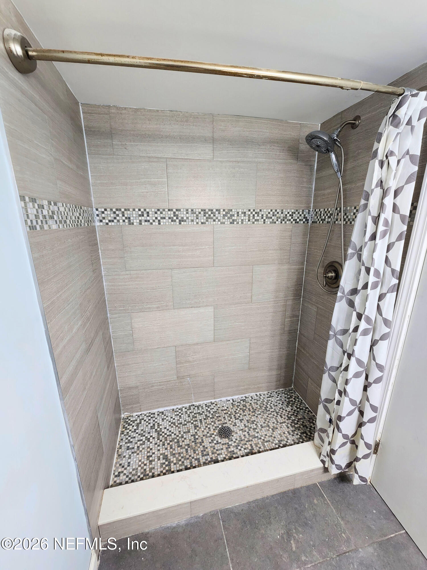 1716 El Camino Road, Unit 1 Jacksonville, FL 32216 - Photo 8 of 15 a bathroom with a shower