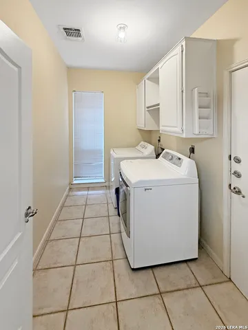 a utility room with a washer and dryer