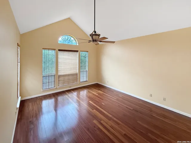 a kitchen with a refrigerator a stove a sink and a window