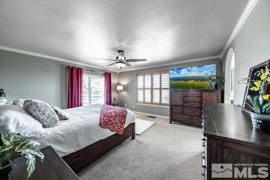 200 Antelope Valley Road Reno, NV 89506 - Photo 14 of 28 a bedroom with a bed window and dresser