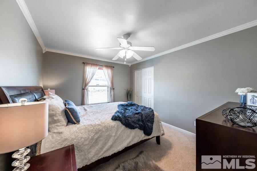 200 Antelope Valley Road Reno, NV 89506 - Photo 17 of 28 a bedroom with a bed and window