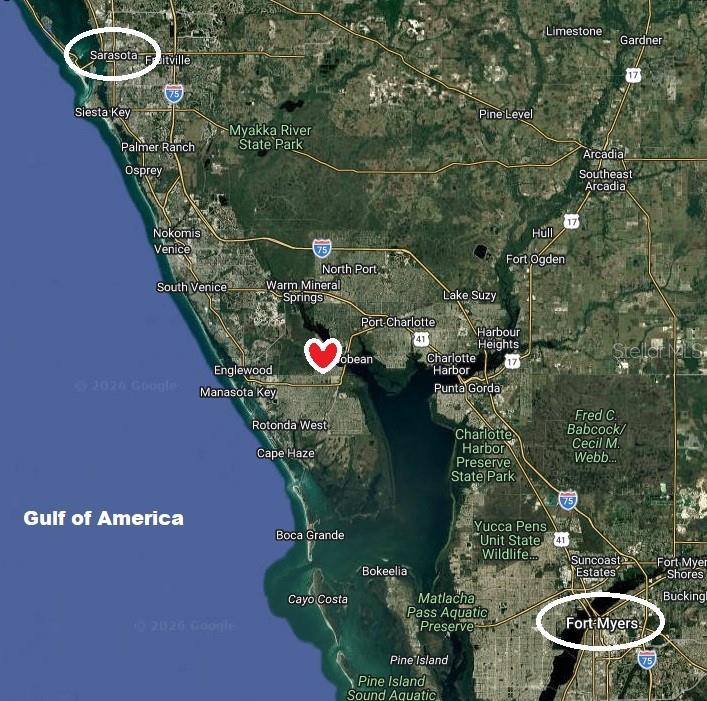 5447 Brussels Terrace Port Charlotte, FL 33981 - Photo 7 of 7 an aerial view of a residential house with outdoor space