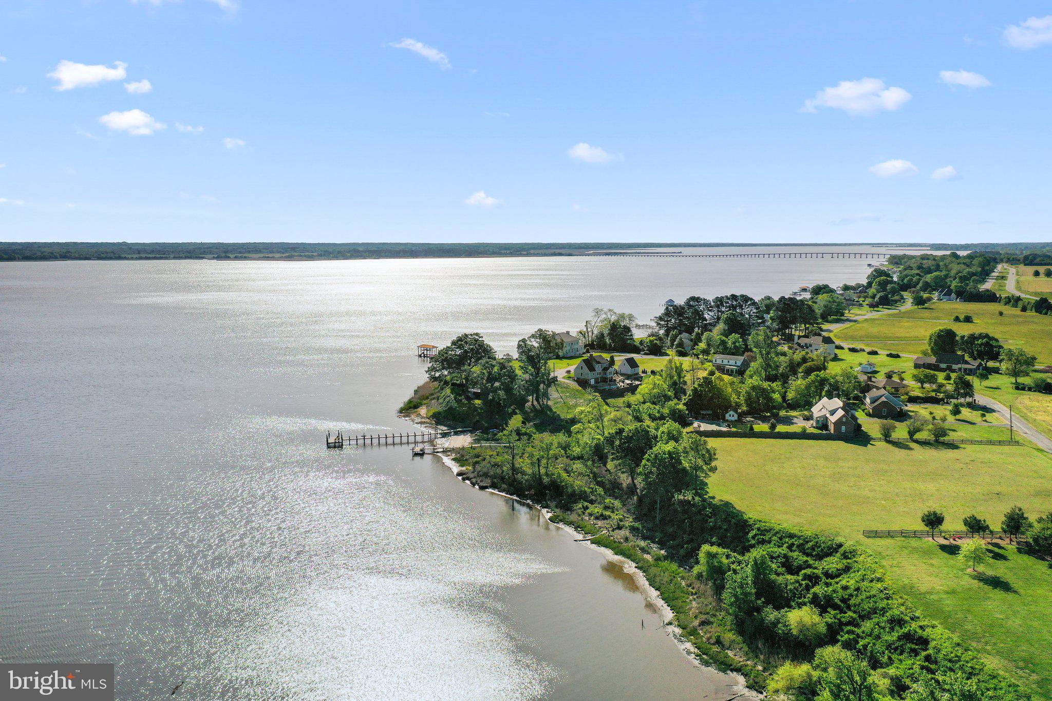 Lot D Benton Point Road Tappahannock, VA 22560 - Photo 4 of 7 a view of a lake with houses in back