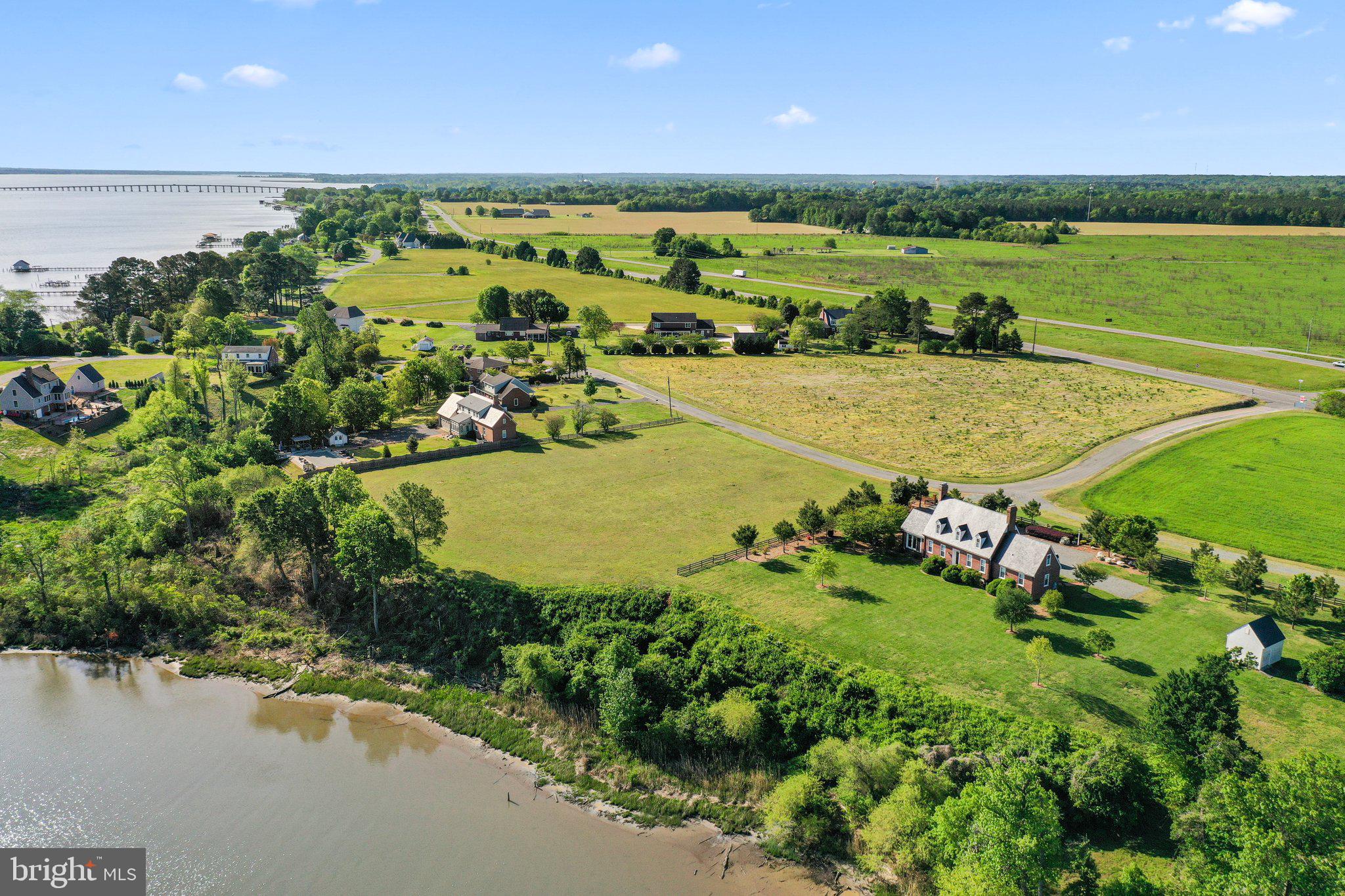 Lot D Benton Point Road Tappahannock, VA 22560 - Photo 5 of 7 a view of a lake with a yard