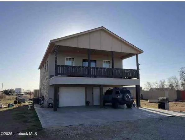 a front view of a house with parking space