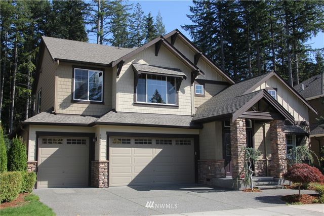 a front view of a house with a porch