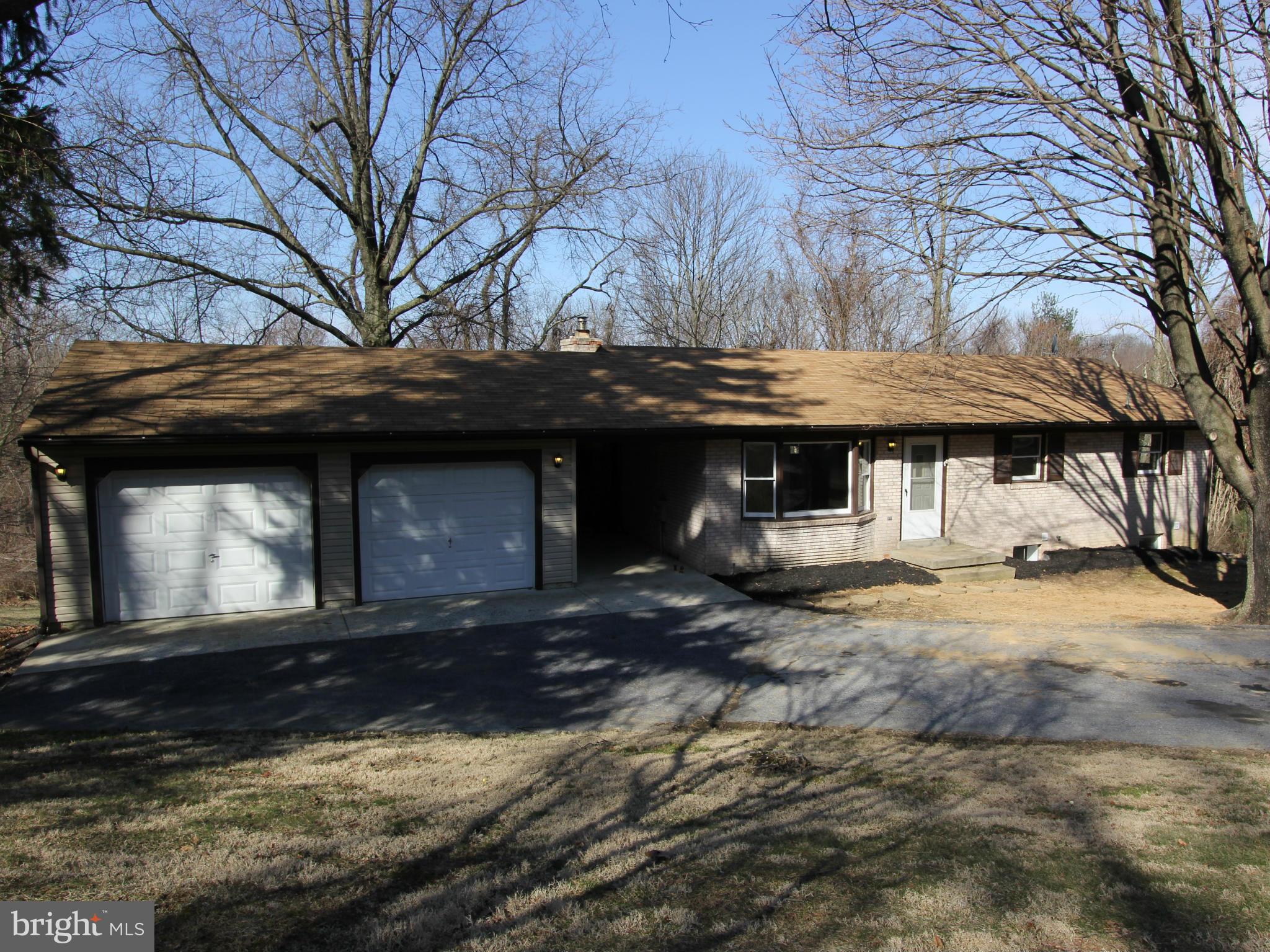 5047 Shookstown Road Frederick, MD 21702 - Photo 1 of 30 a front view of a house with a yard