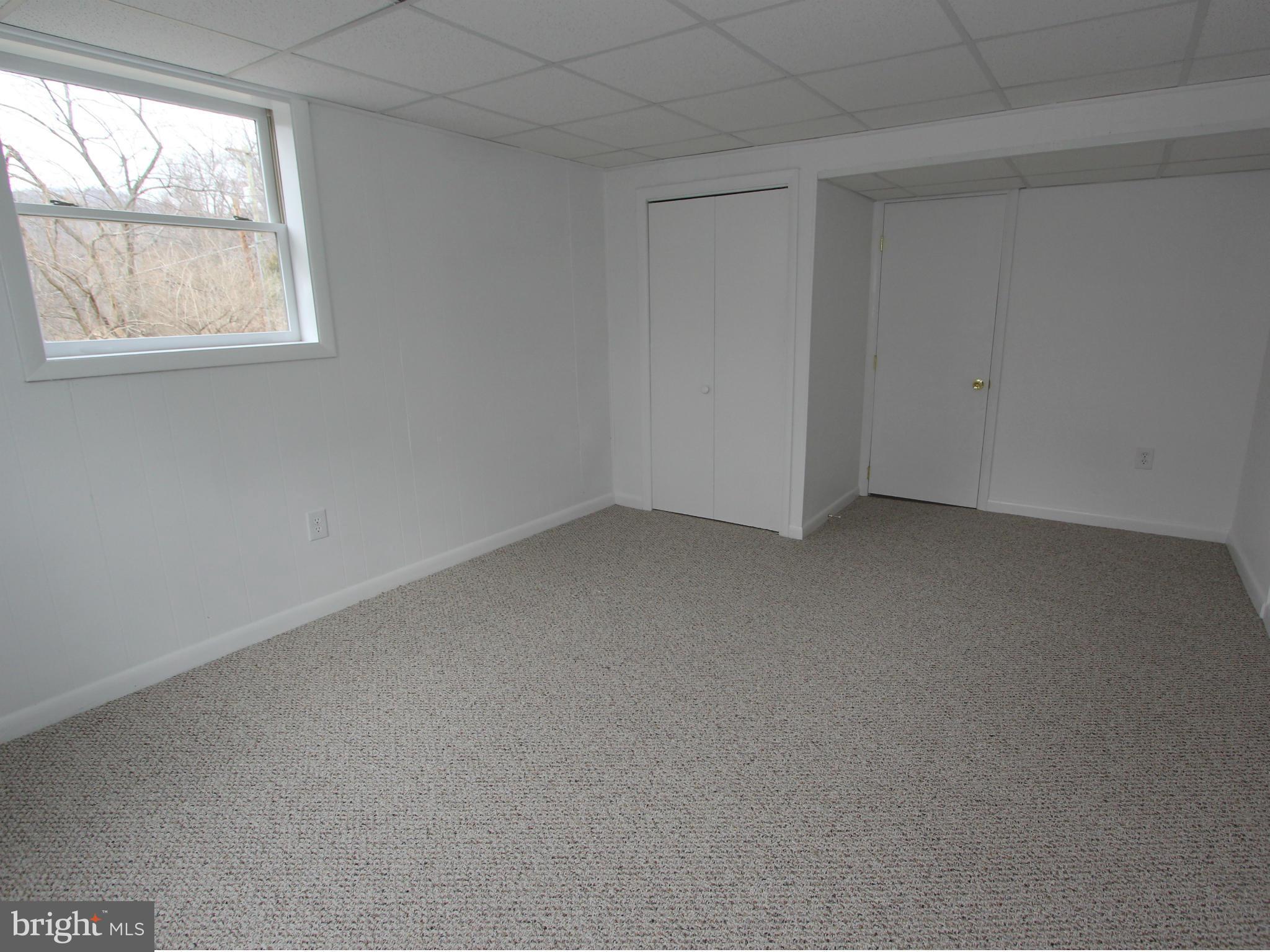 5047 Shookstown Road Frederick, MD 21702 - Photo 13 of 30 an empty room with a window