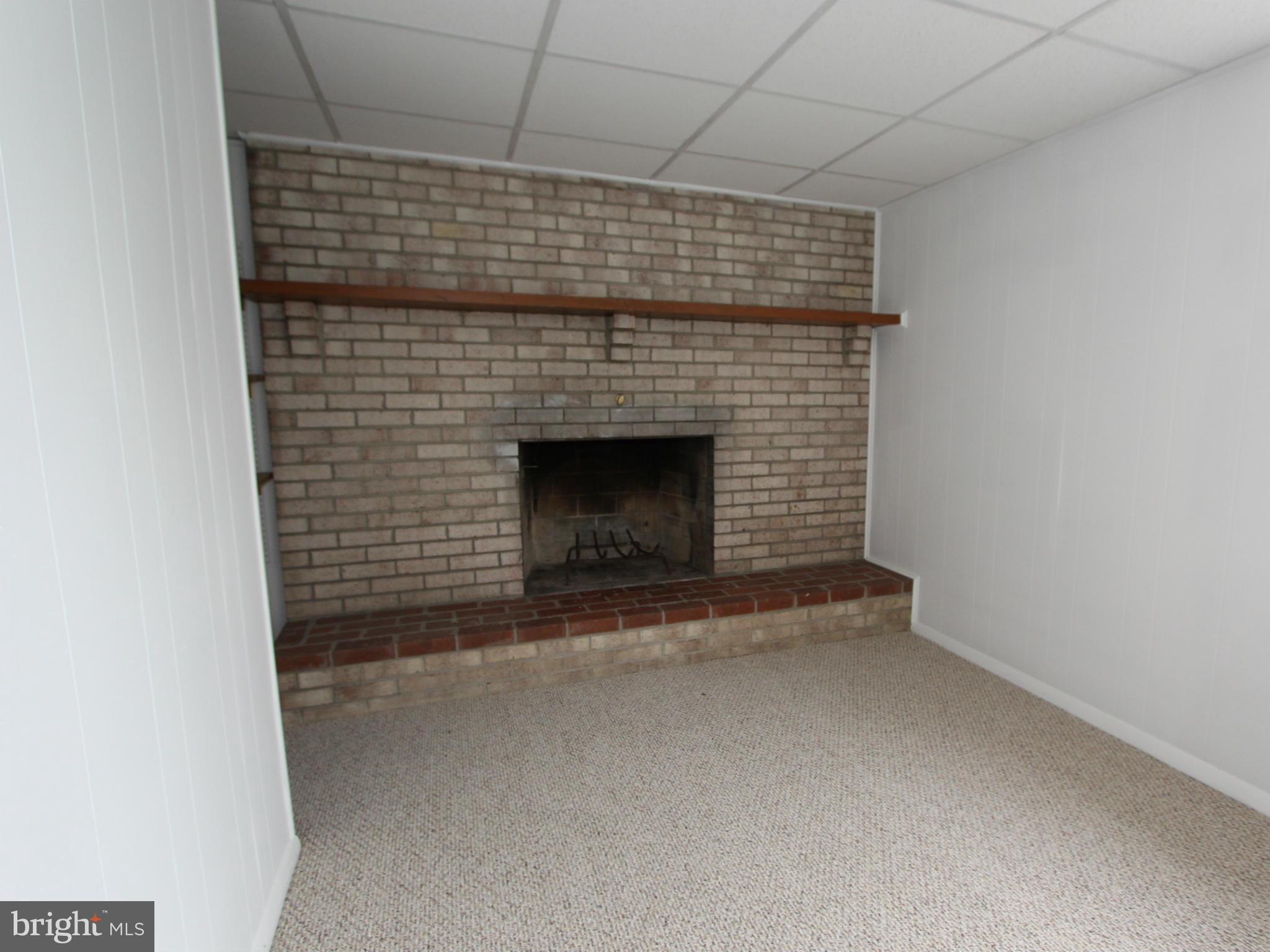 5047 Shookstown Road Frederick, MD 21702 - Photo 17 of 30 a view of empty room with a fireplace