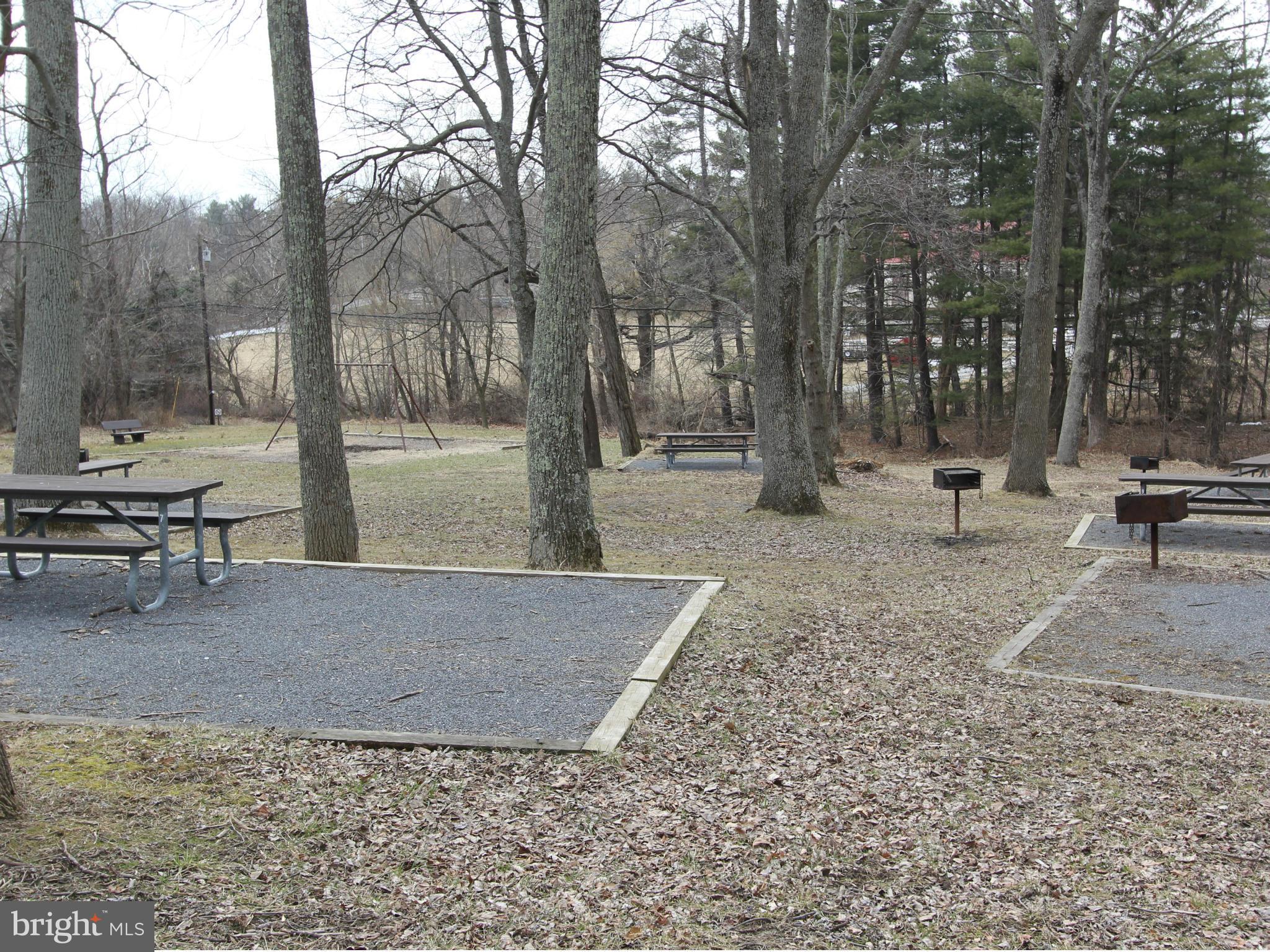 5047 Shookstown Road Frederick, MD 21702 - Photo 28 of 30 a view of a park with swings and slides