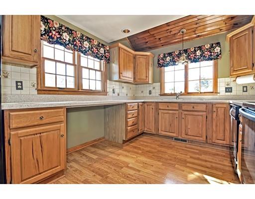 82 Jefferson Road Bourne, MA 02532 - Photo 9 of 30 a kitchen with a sink stove and cabinets